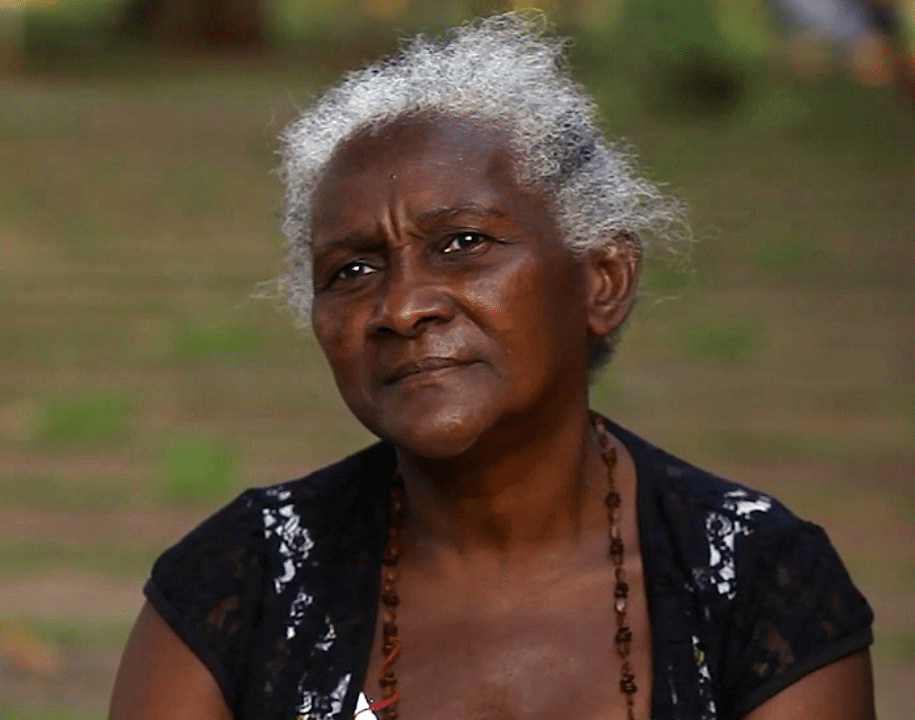 A portrait of an elderly Afro-Brazilian woman named Dona Dije.
