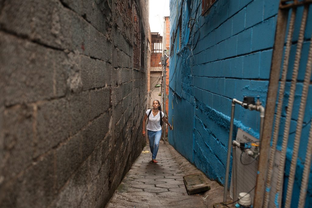 Student activist Ninive walks long distances to get between home and university.