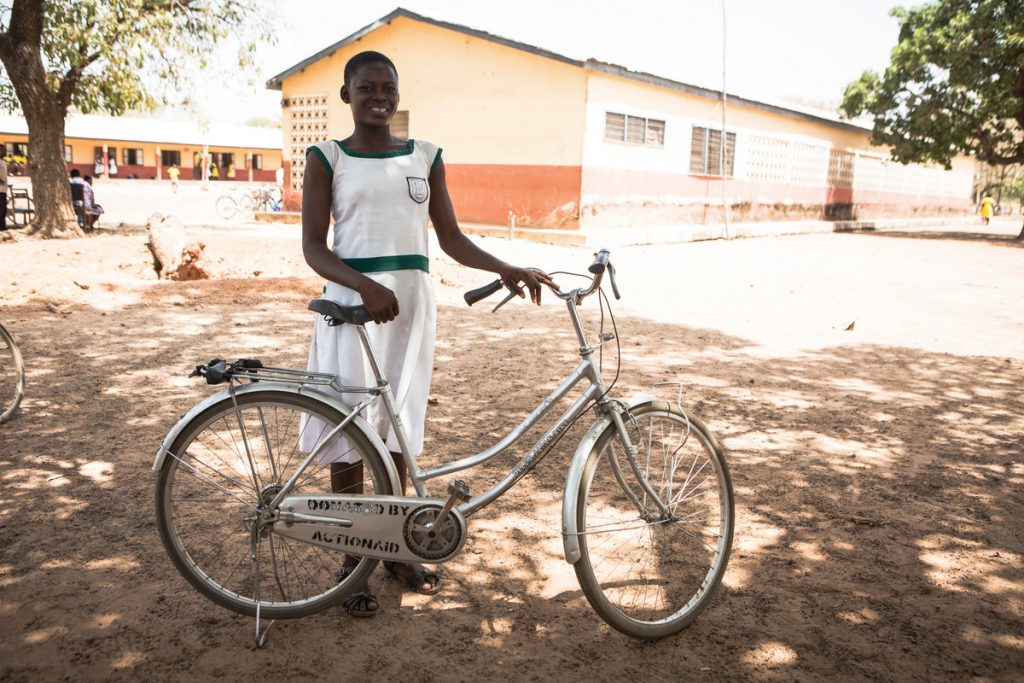 Eunice with her bike in Ghana