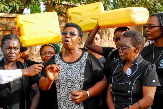 Black Monday female activists in Uganda protest deficiencies in public health funding.