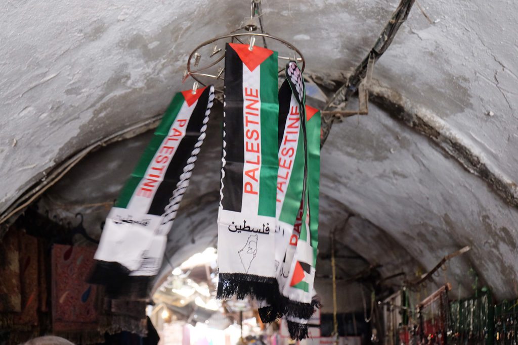 Small Palestinian flags waving in the wind in the Old City, Jerusalem.