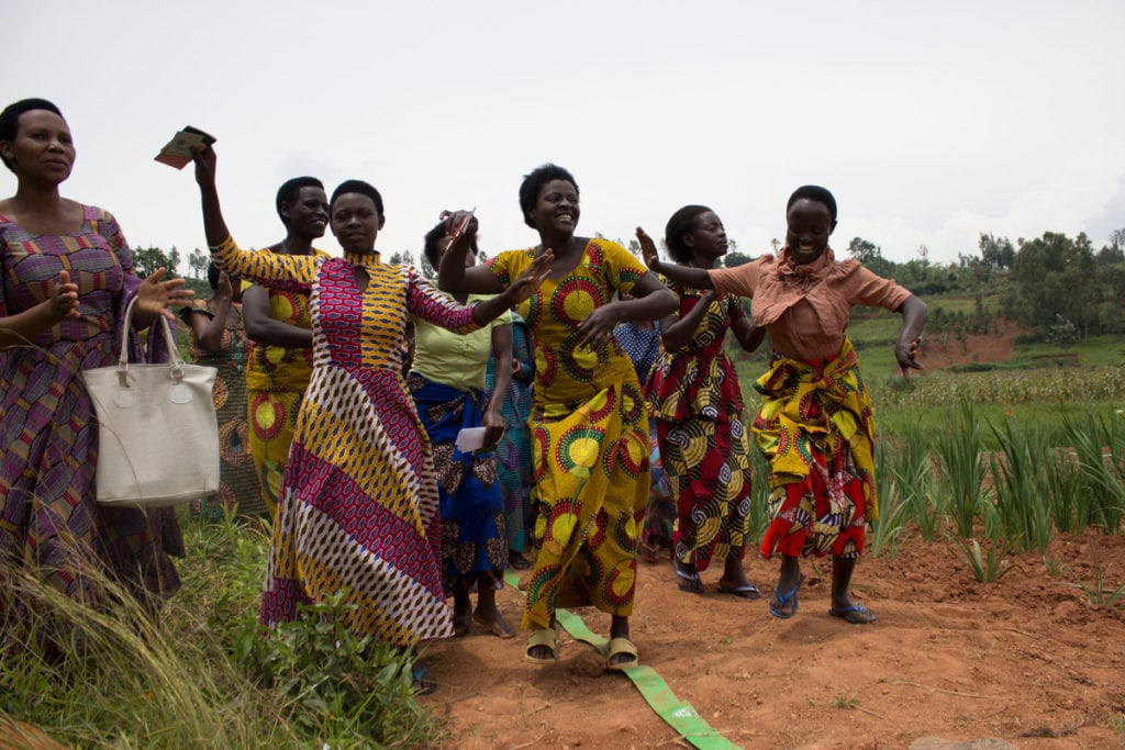 Women from Aboroshya women's group in Rwanda celebrate their training in women's rights. They are rising up against discrimination.