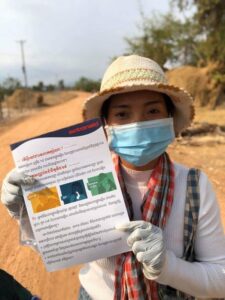 One of our partners in Cambodia distributes flyers on coronavirus prevention communities.