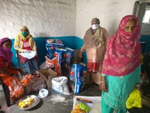 Volunteers at the Gauravi Centre packing the food to be delivered.
