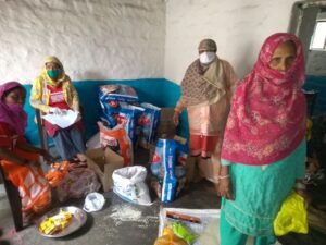 Volunteers at the Gauravi Centre packing the food to be delivered. 