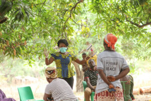 Woman demonstrating best practices to stop the spread of coronavirus