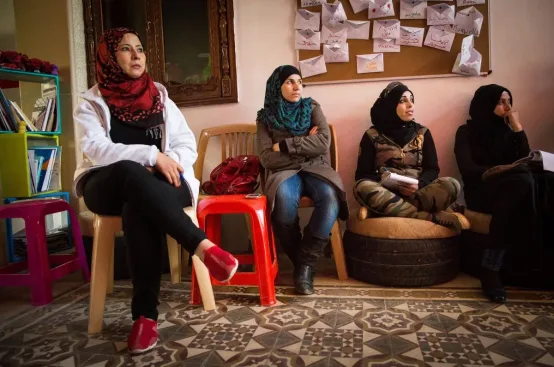 At the ActionAid community center, women participate in training sessions. Photo: Celia Peterson/ActionAid