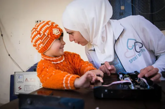 Bushra with her niece. Photo: Celia Peterson/ActionAid USA