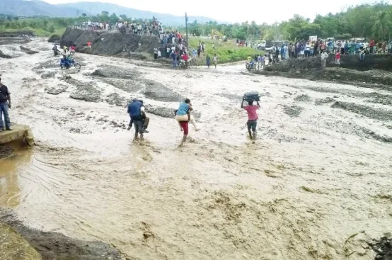 A major bridge connecting Southwest Haiti to the capital, Port-au-Prince was washed away in the floods. Photo: ActionAid