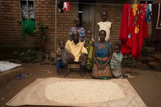 Edina and family with some of the maize she has harvested from her land covered by a GAFSP-funded irrigation scheme in Malawi. Photo: Eva-Lotta Jansson/ActionAid