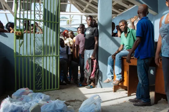 Local Haitian-led teams distribute food in Roseaux, Grand Anse. Photo: Dylan Roberts/FreeSociety/ActionAid