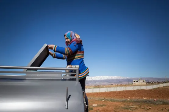Ghroub drives a truck selling water in the neighborhood. Photo: Celia Peterson/ActionAid USA