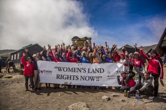 African women farmers and solidarity trekkers. Photo: Georgina Goodwin/ActionAid