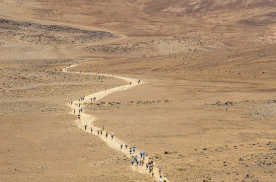 Heading across “The Saddle” toward Kilimanjaro’s summit. Photo: Georgina Goodwin/ActionAid