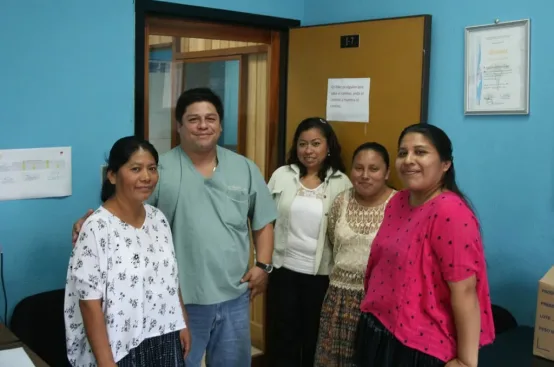 Alejandrina (far left) with Dr. Gandhi Ernesto Caballeros and others at Sayaxché Hospital. Photo: Jacobo Blijdenstain/ActionAid