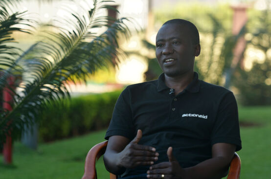 Joram, project manager of the PFA project in Tanzania, works with local farmers to conduct social audits. Photo: Allan Gichigi/ActionAid